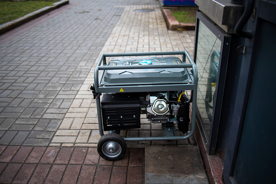 a small engine is parked in front of a store